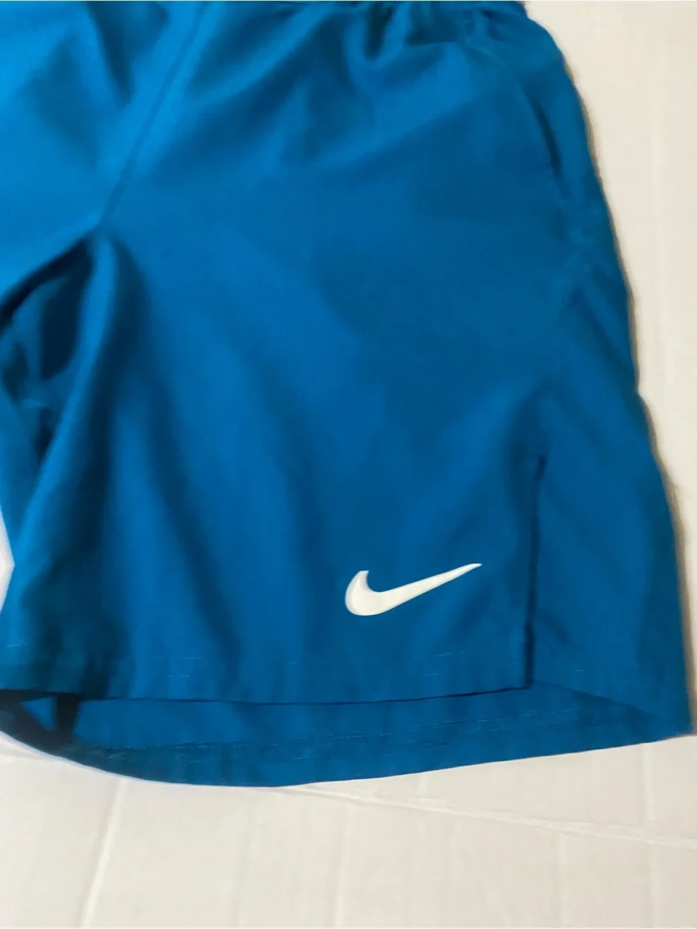 Nike Men's Bright Teal Athletic Shorts with White Swoosh